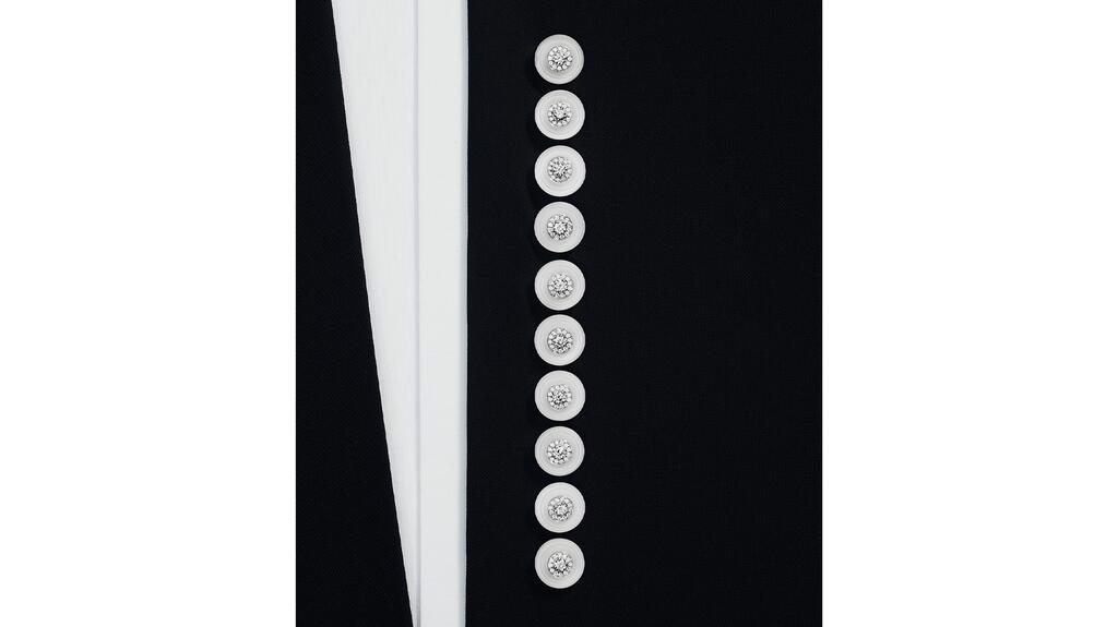 “Les Boutons” is comprised of 15 white gold buttons set with diamonds and rock crystal. Boucheron Power of Couture buttons